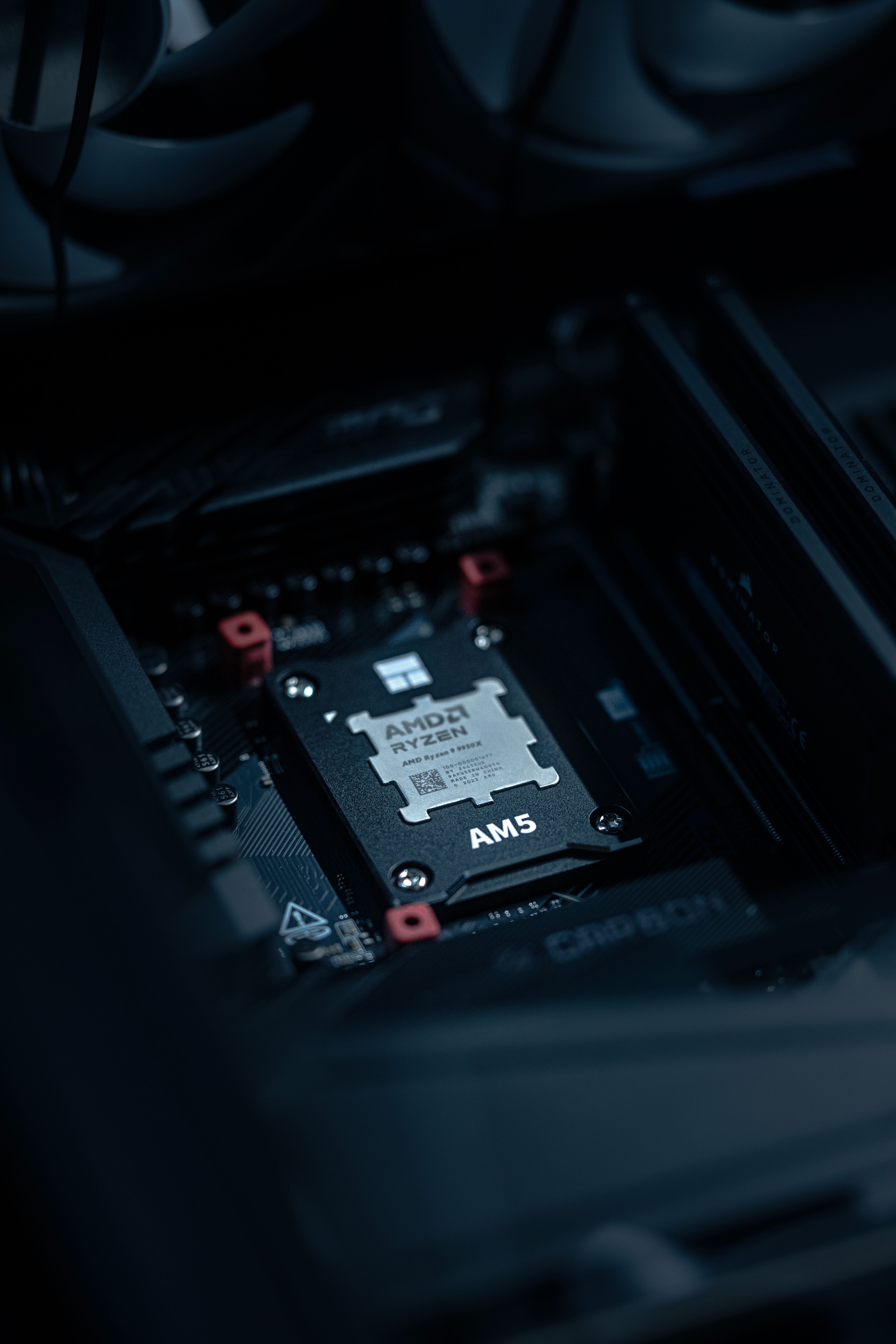 Detailed view of an AMD Ryzen processor securely placed on a motherboard, ideal for tech enthusiasts.