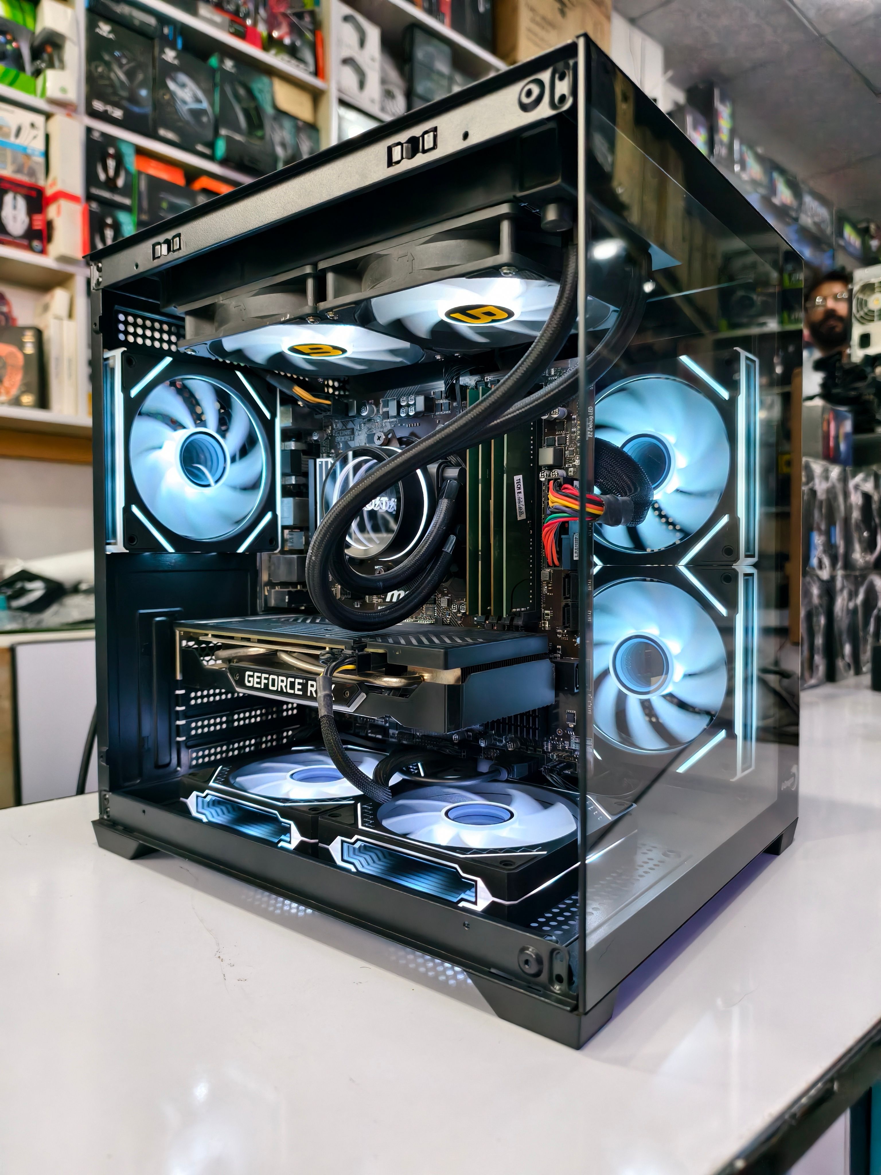 A sleek gaming PC setup featuring advanced cooling and modern design for optimal performance.