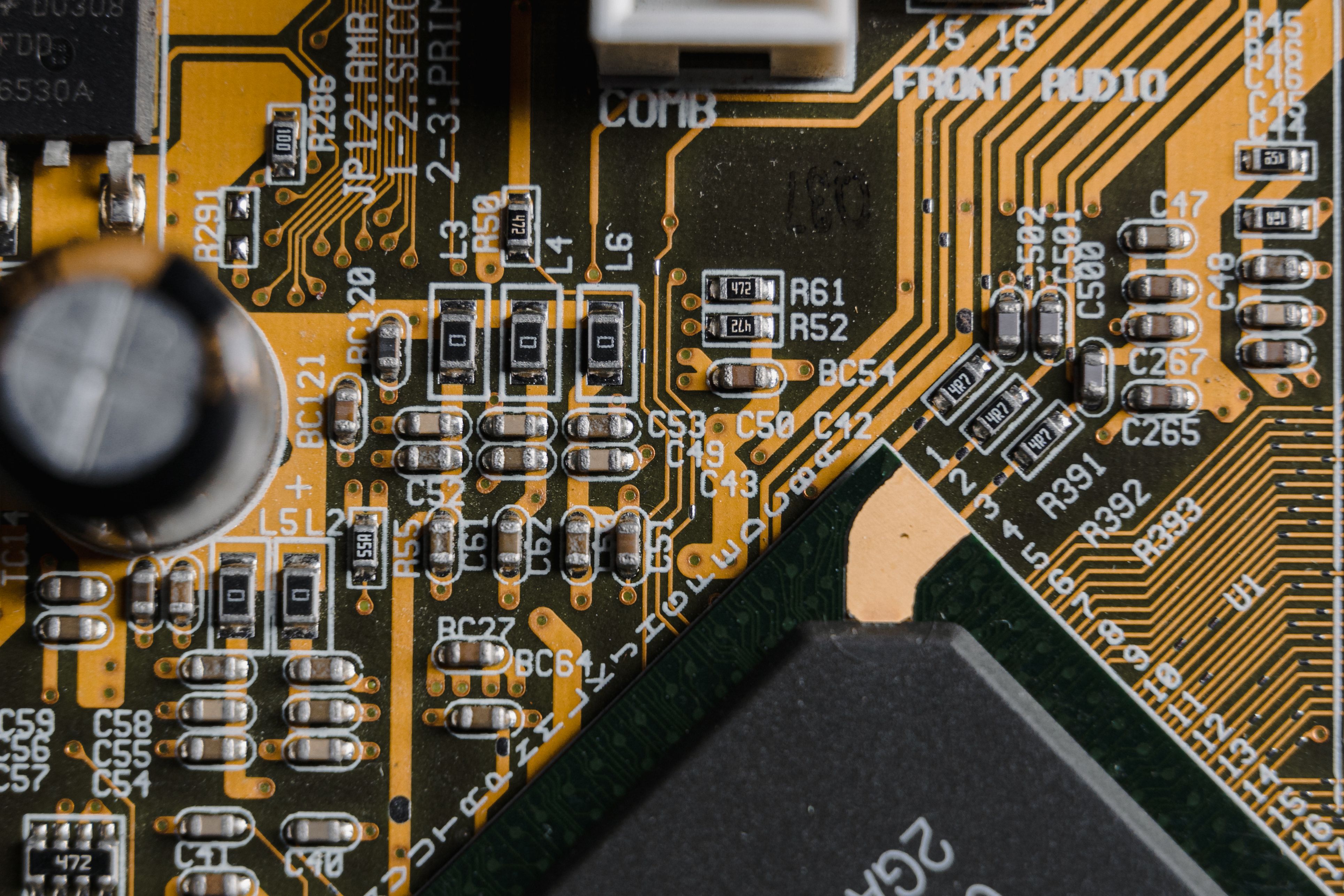 High-resolution close-up of a circuit board showing intricate electronic components and pathways.