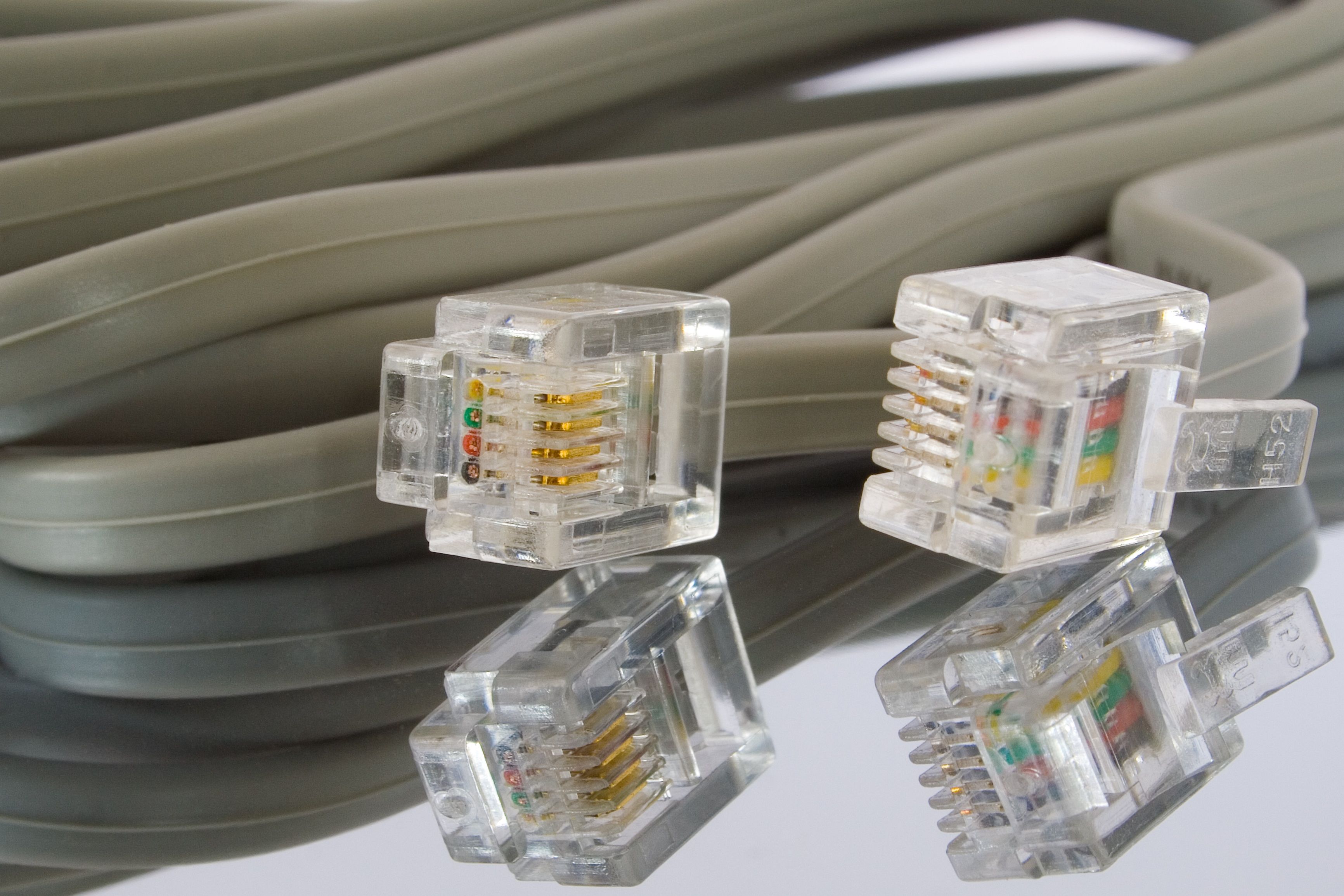 Detailed image of Ethernet cables and connectors, ideal for tech themes.